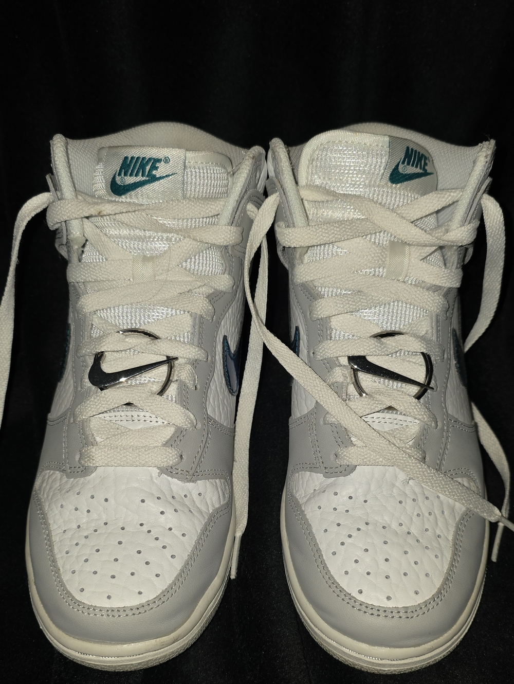 Nike Women’s White and Teal High-Top Sneakers